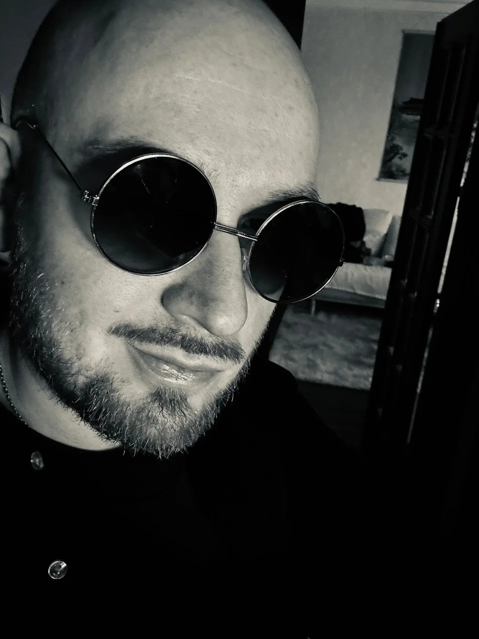 Aleksej Vlodavskij wearing round sunglasses